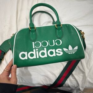 Designer inspired monogram duffle bag with striped detail